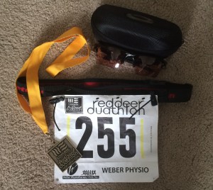 Obligatory bib number shot...complete with my gold medal and brand new Oakley Fast Jackets courtesy of the race organizers for my overall win!